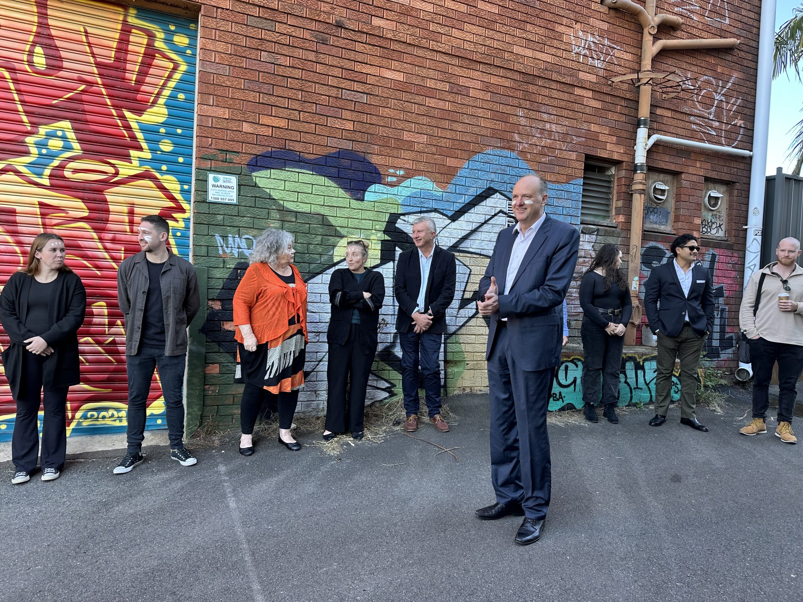 Circle of staff. National Reconciliation Week