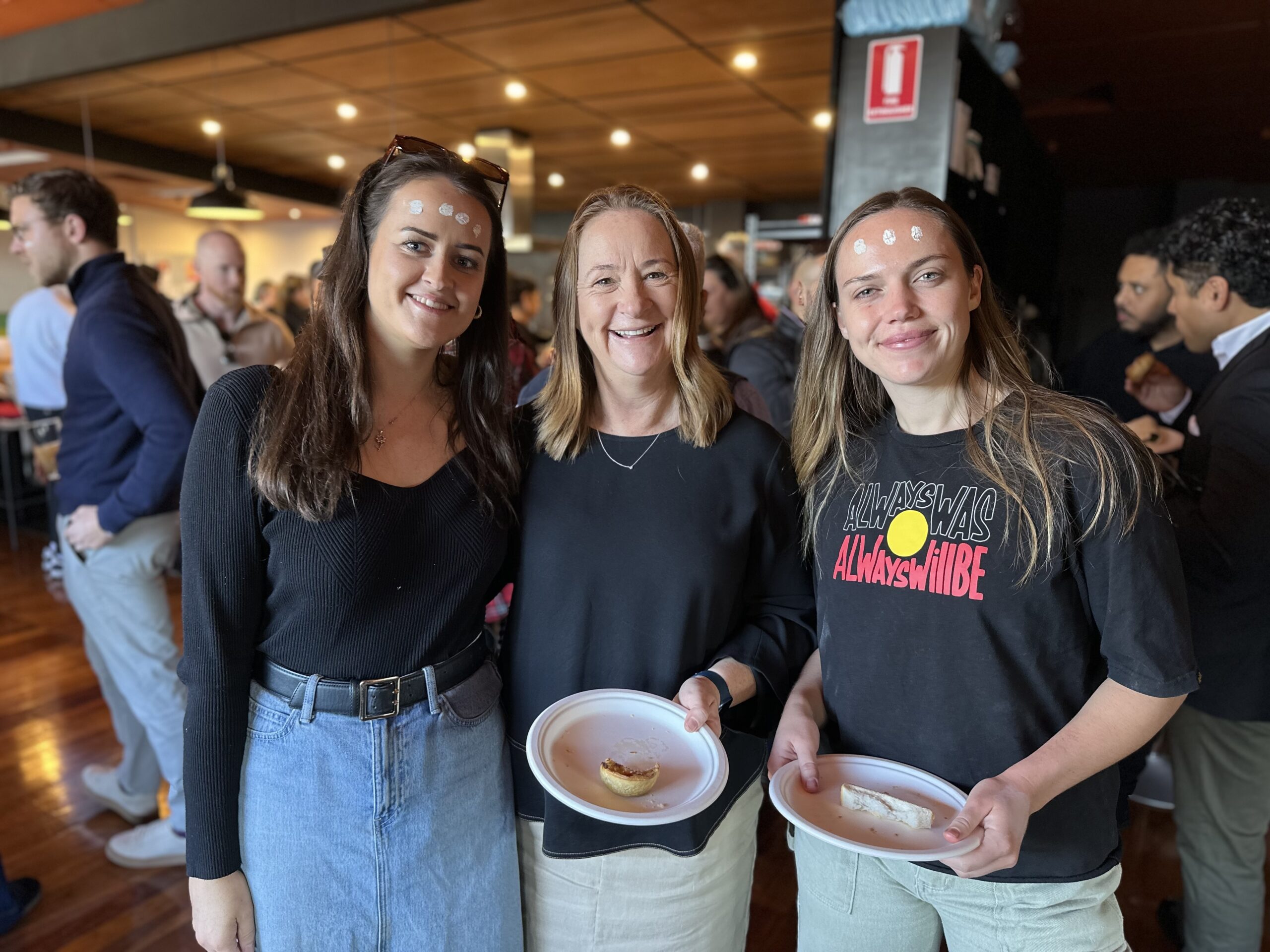 Staff enjoying food at NRW2024